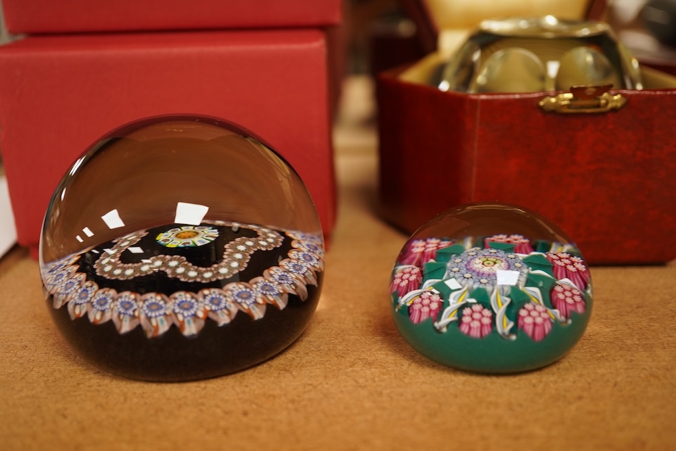 Three boxed Perthshire paperweights together with two further examples, unboxed, some millefiori, largest 7cm in diameter (5)
